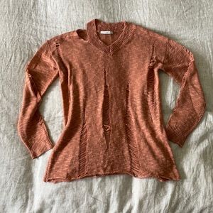 Distressed rust sweater